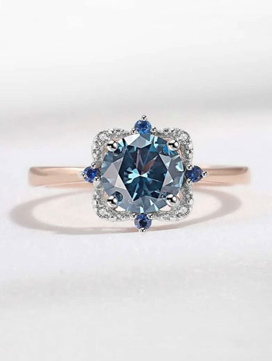 Rings, silver, covered with gold plating. Insert blue round zirconium